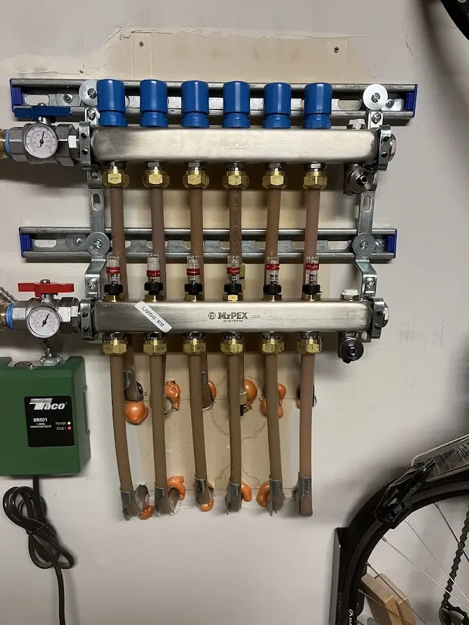 Plumber performing Water Heater Repair at a residential property in Rapid City